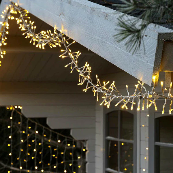 Lexi Lighting 720 LED Cluster Christmas Lights with Clear Cable - Warm White - Image 5